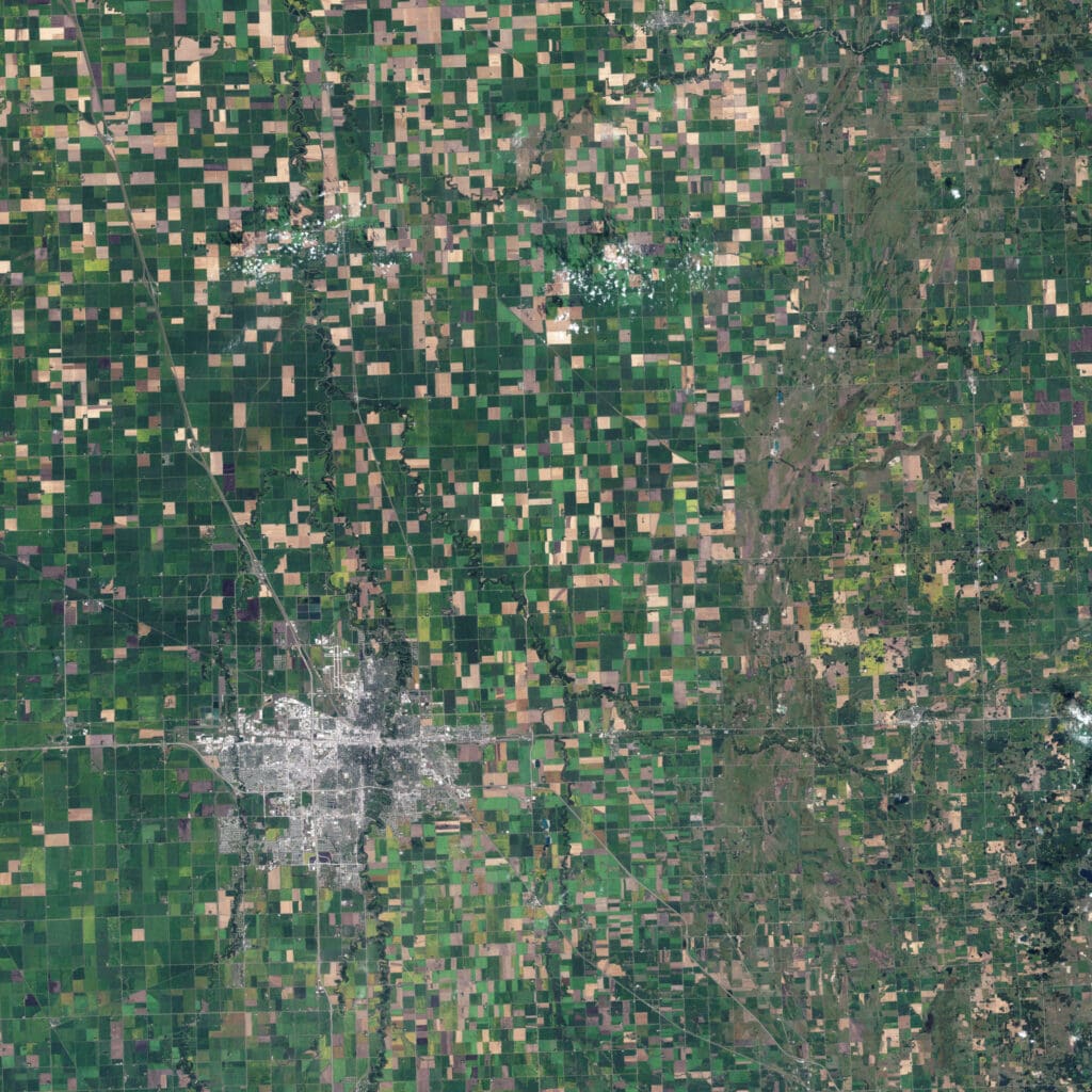 NASA satellite picture for precision farming in Minnesota, showing a pixelated area of yellow, beige and green rectangular fields