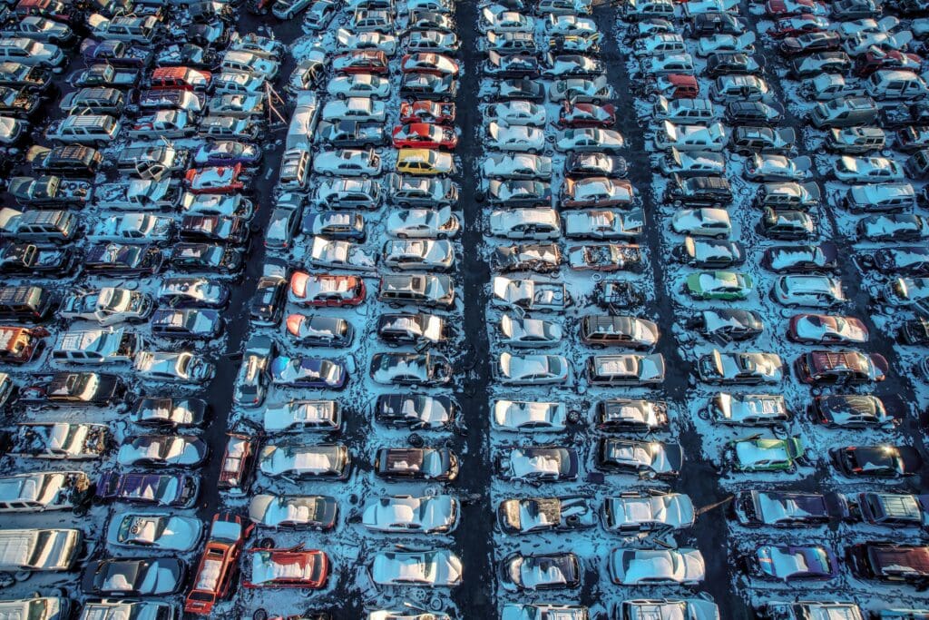 Big vehicle scrapyard with lots of semi-dismantled cars